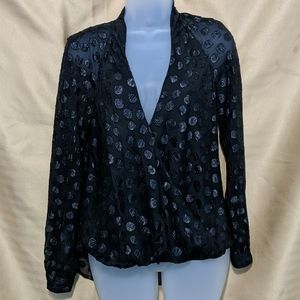 Jennifer Lopez black sheer polka-dotted blouse